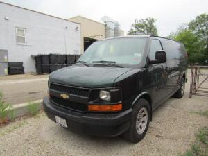 2014 Chevrolet Express Van Model G13405, VIN 1GCSGAFX1E1134256, Rubber Mats, Front Seat Partition to Rear with Door Access, Clean Interior, Cloth Seats (34,008 miles indicated) (passenger rear panel dent)